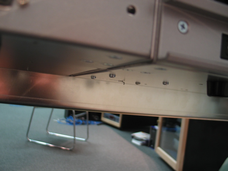 Physical inspection photograph of the D-Control stand and console interface.